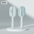 Two blue handheld cleaning brushes on a gray background