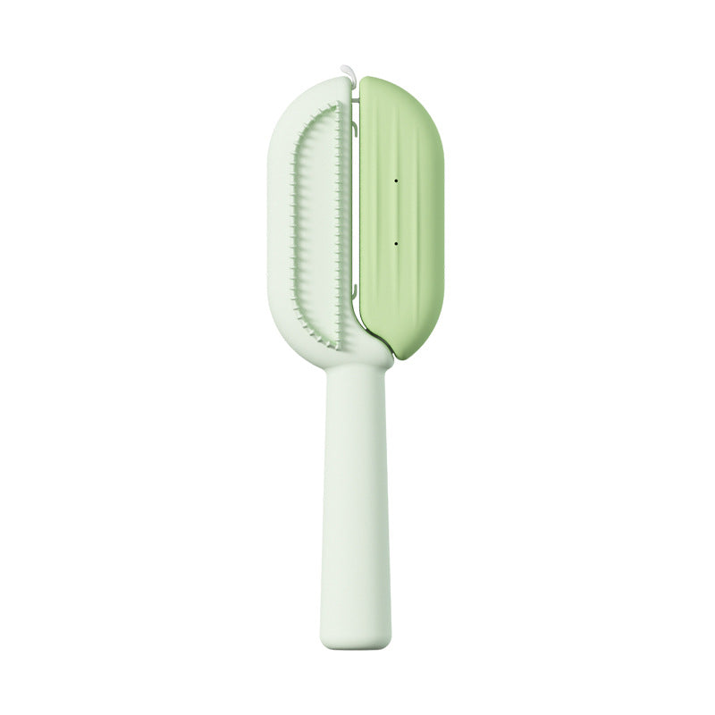 A dual-sided hairbrush with a mint green and off-white handle, featuring one side with white bristles and the other with a smooth mint green cover, 